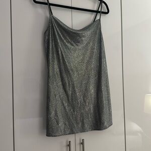 It is a size SX that runs large and can also be worn as a dress